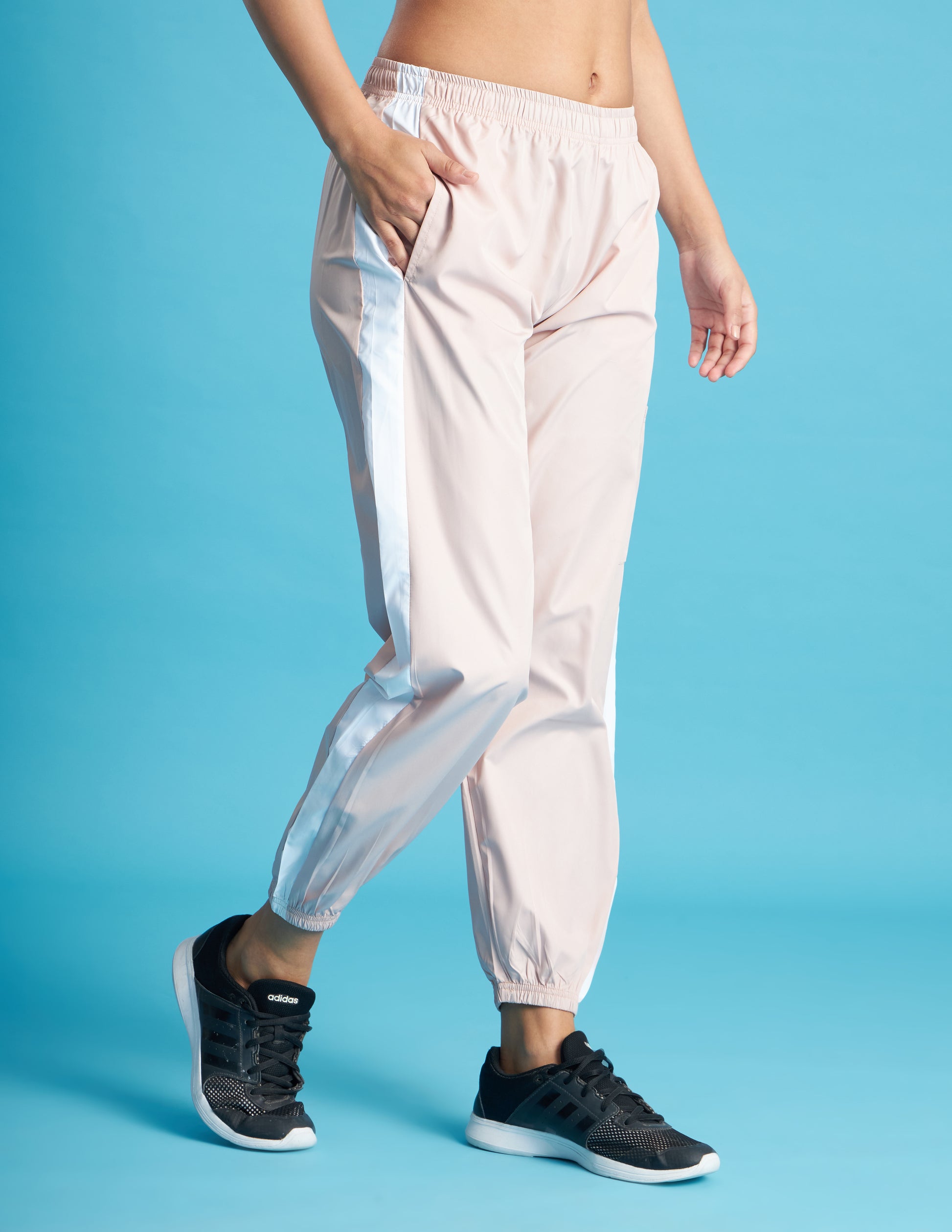 Women Peach NS Loose Fit Solid Training Woven Joggers HIDELT