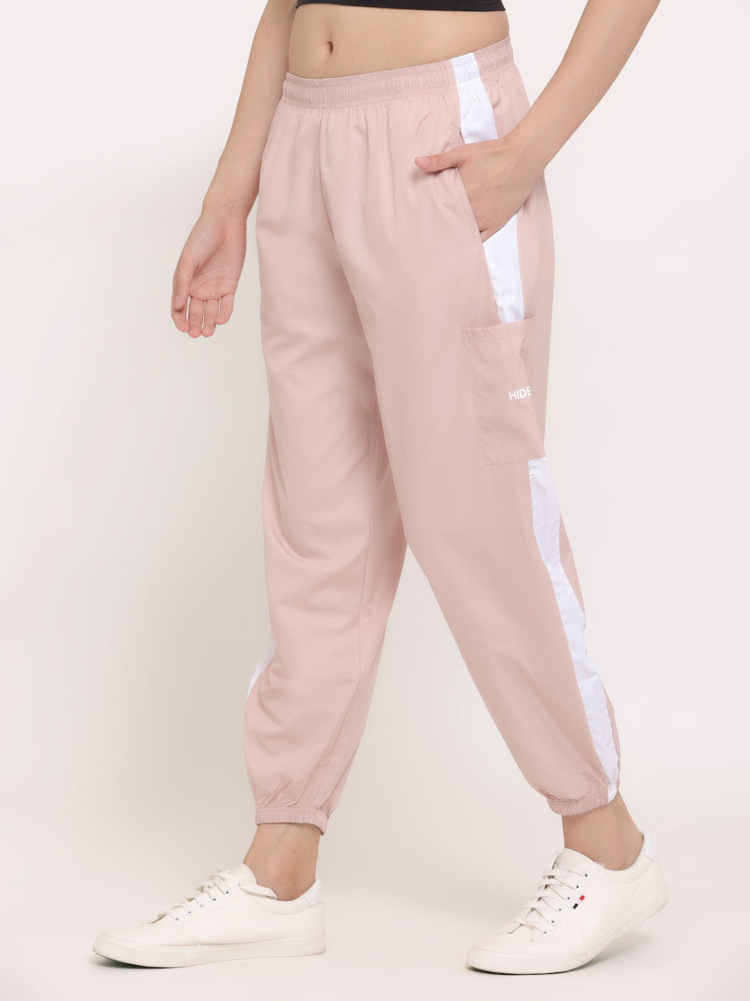 Women Peach NS Loose Fit Solid Training Woven Joggers